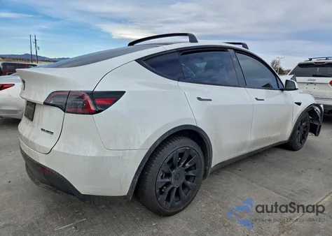 2023 Tesla Model Y from USA, damaged, VIN 7SAYGAEE1PF849335